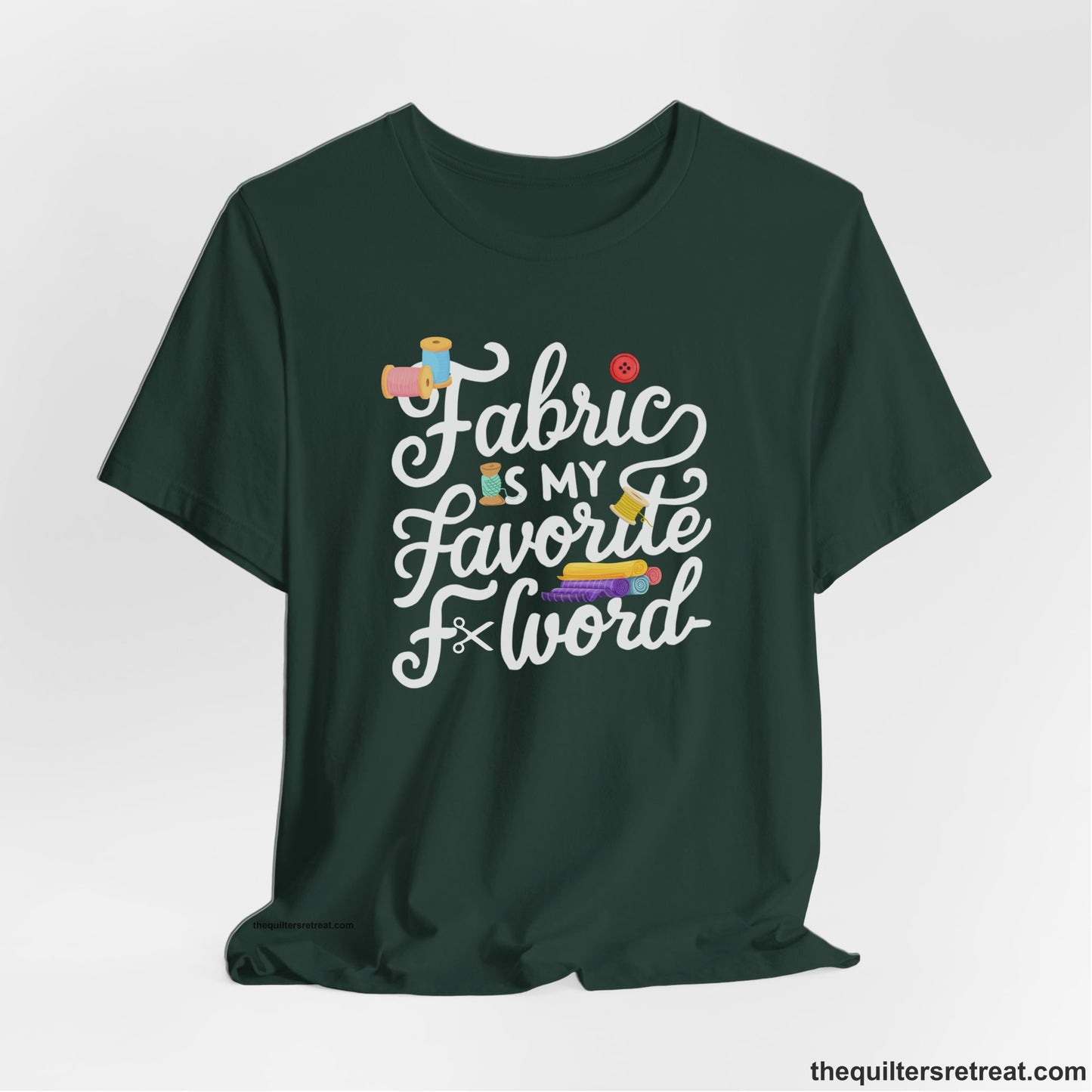 A Forest Short Sleeve T-Shirt with a fabric is my favorite f word text with colorful spools and buttons in a playful style