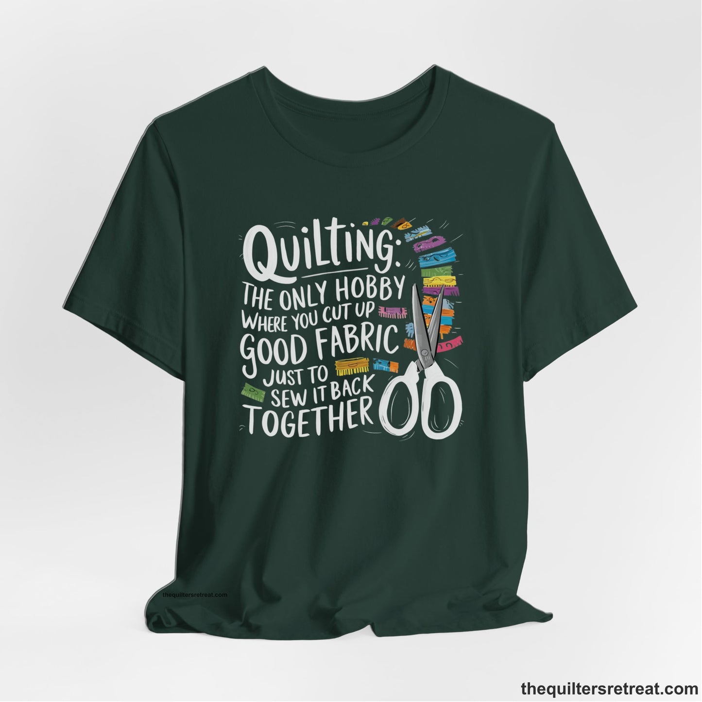 A Forest Short Sleeve T-Shirt with a quilting-themed text with colorful fabric pieces and scissors in a whimsical style