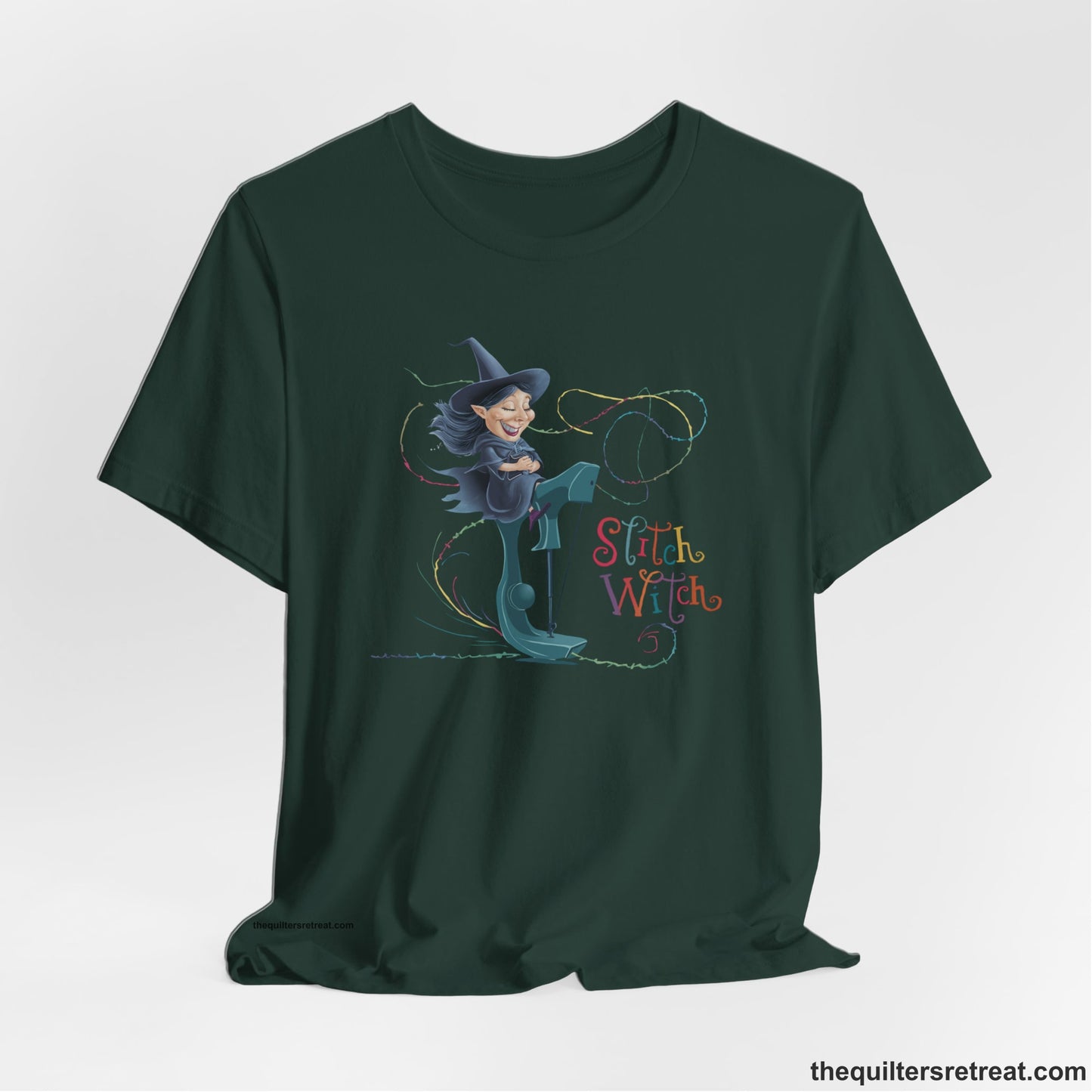 A Forest Short Sleeve T-Shirt with a witch on vintage sewing machine with "Stitch Witch" text in playful, colorful style