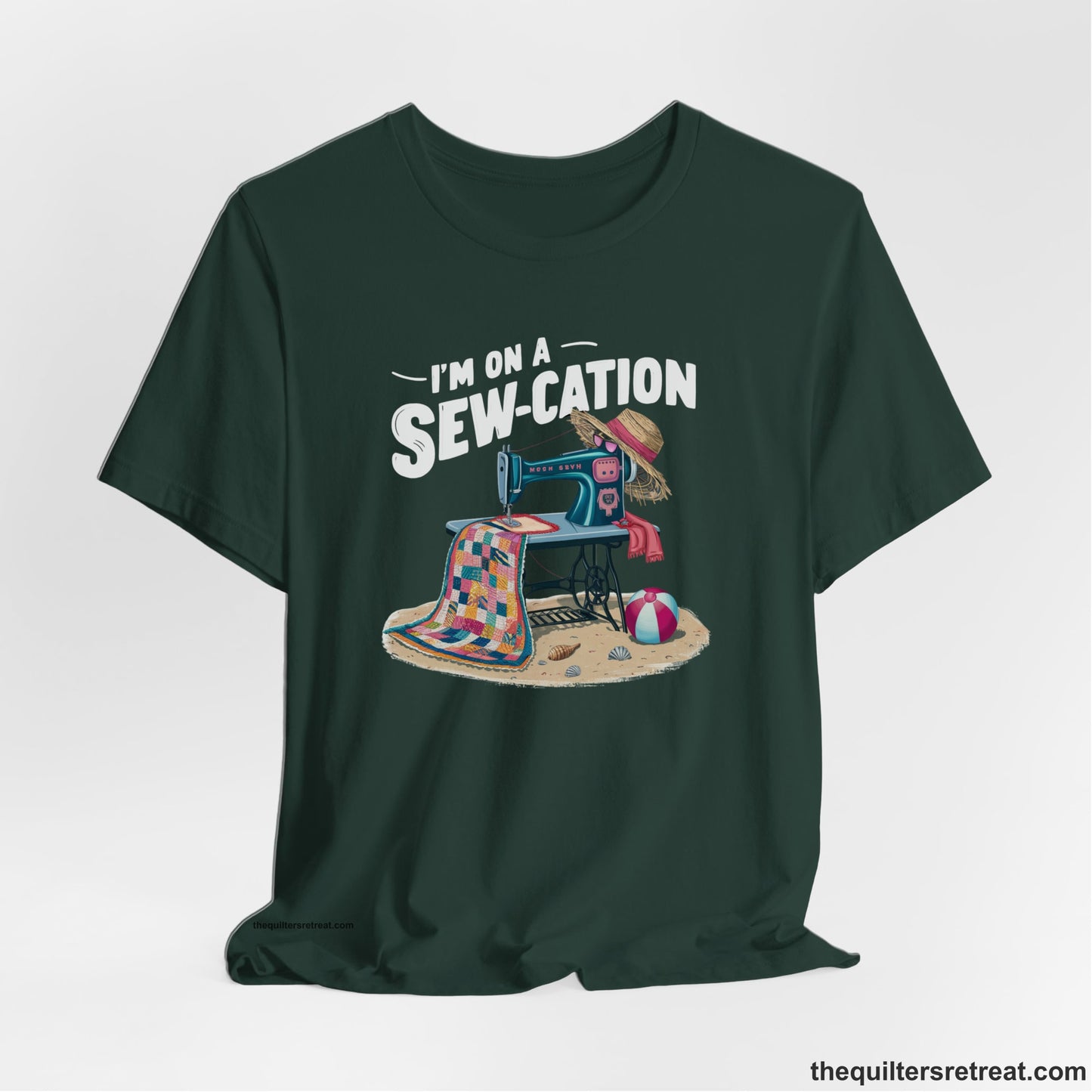 A Forest Short Sleeve T-Shirt with a vintage sewing machine with colorful quilt, beach items, and "I'm On A Sew-Cation" text