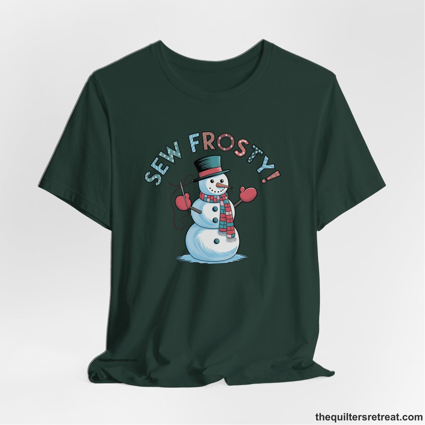 A Forest Short Sleeve T-Shirt with a playful snowman sewing illustration with "Sew Frosty!" text in a festive style