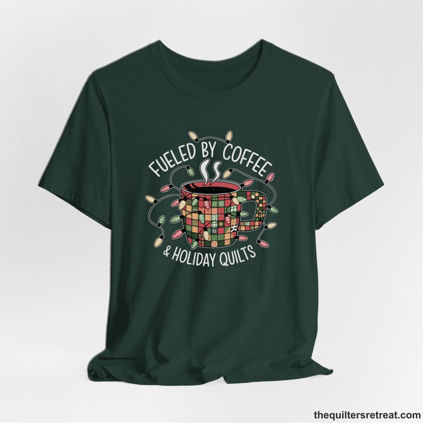 A Forest Short Sleeve T-Shirt with a patchwork coffee mug with colorful lights and subtle "Fueled by Coffee" text in festive style
