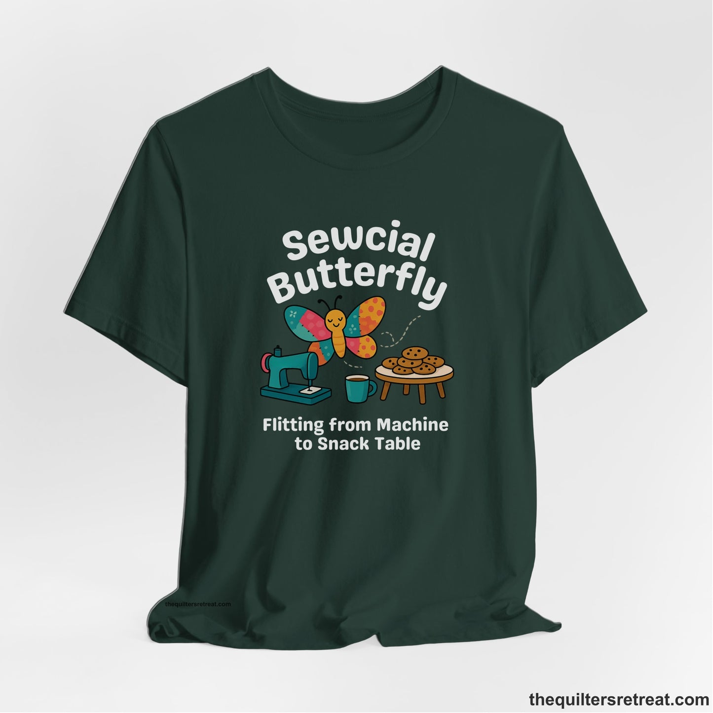 A Forest Short Sleeve T-Shirt with a playful butterfly near sewing machine with cookies and coffee doodle design