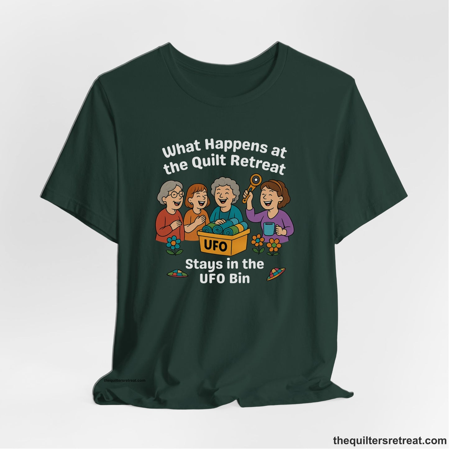 A Forest Short Sleeve T-Shirt with a four smiling women with unfinished fabric objects and playful "UFO" text in a cartoon style