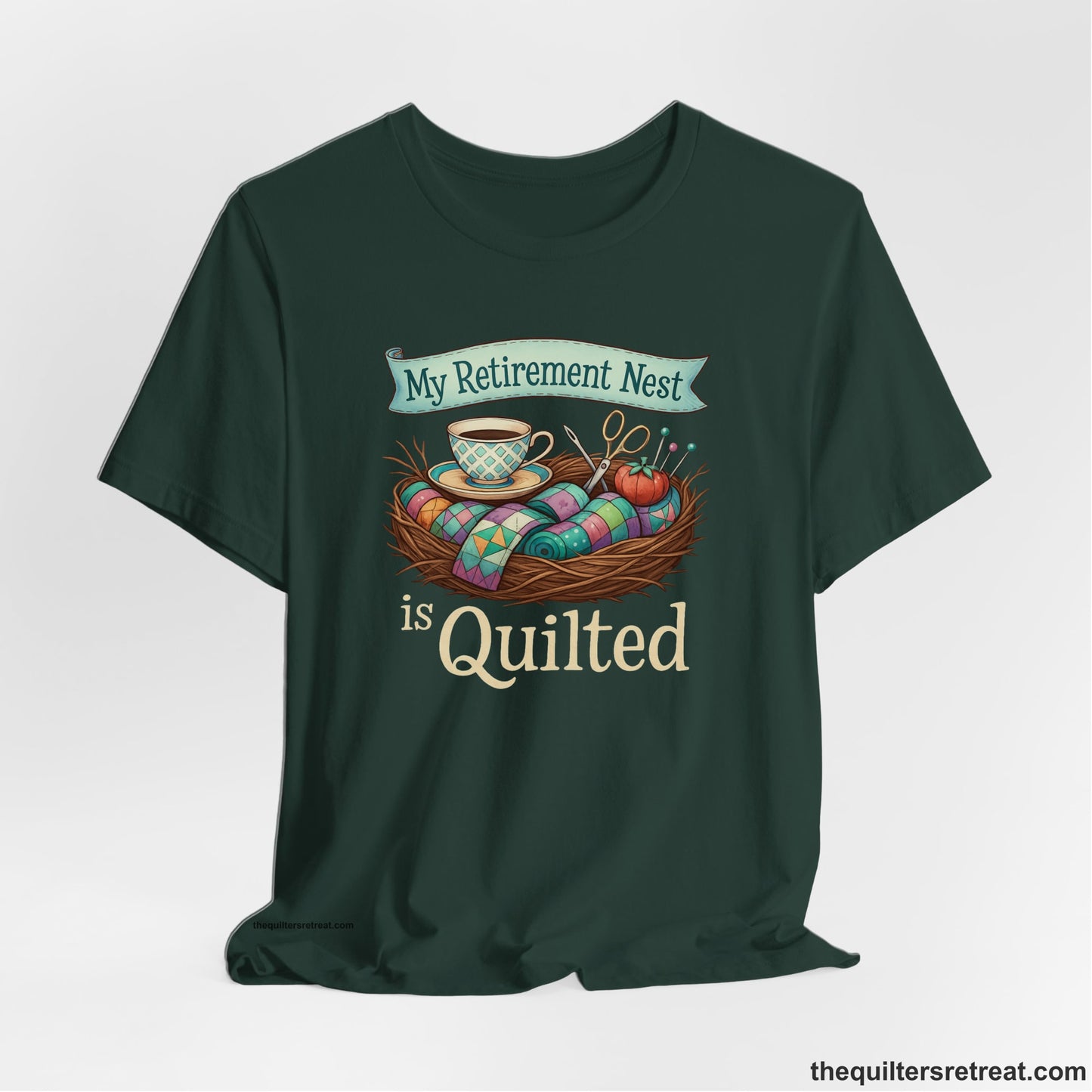 A Forest Short Sleeve T-Shirt with a My Retirement Nest is Quilted text with a cozy sewing elements illustration