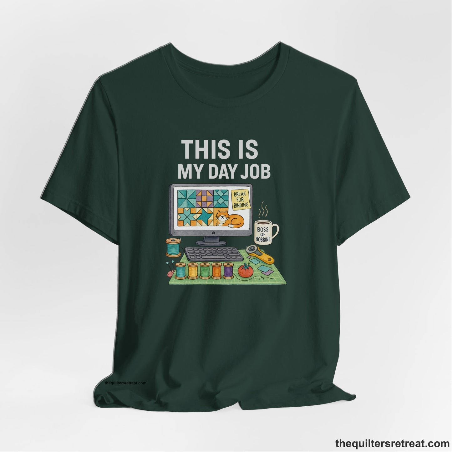 A Forest Short Sleeve T-Shirt with a computer quilt design, cat illustration, "THIS IS MY DAY JOB" text with sewing tools, playful style