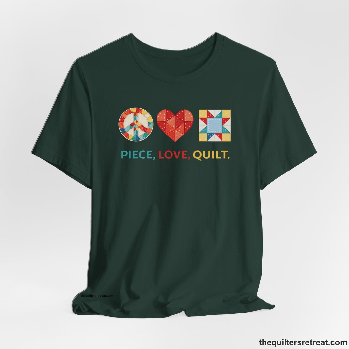 A Forest Short Sleeve T-Shirt with a Colorful quilt patterns, "PIECE, LOVE, QUILT." text, whimsical style.