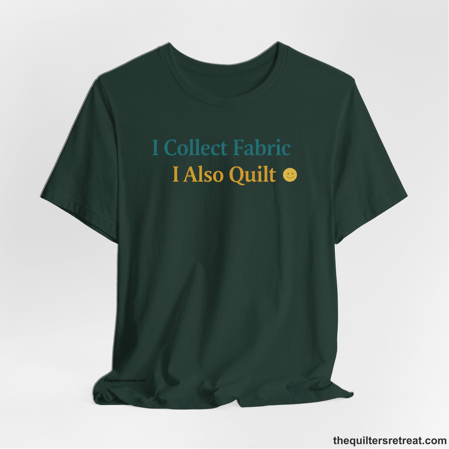A Forest Short Sleeve T-Shirt with a Colorful text saying "I Collect Fabric I Also Quilt" with a playful, cheerful vibe.