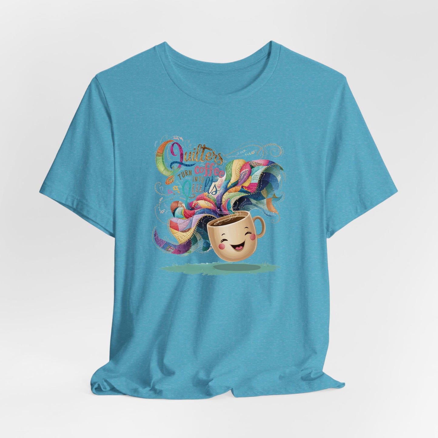 A Heather Aqua Short Sleeve T-Shirt with a quirky "Quilters Turn Coffee into Quilts" text with vibrant swirling patterns