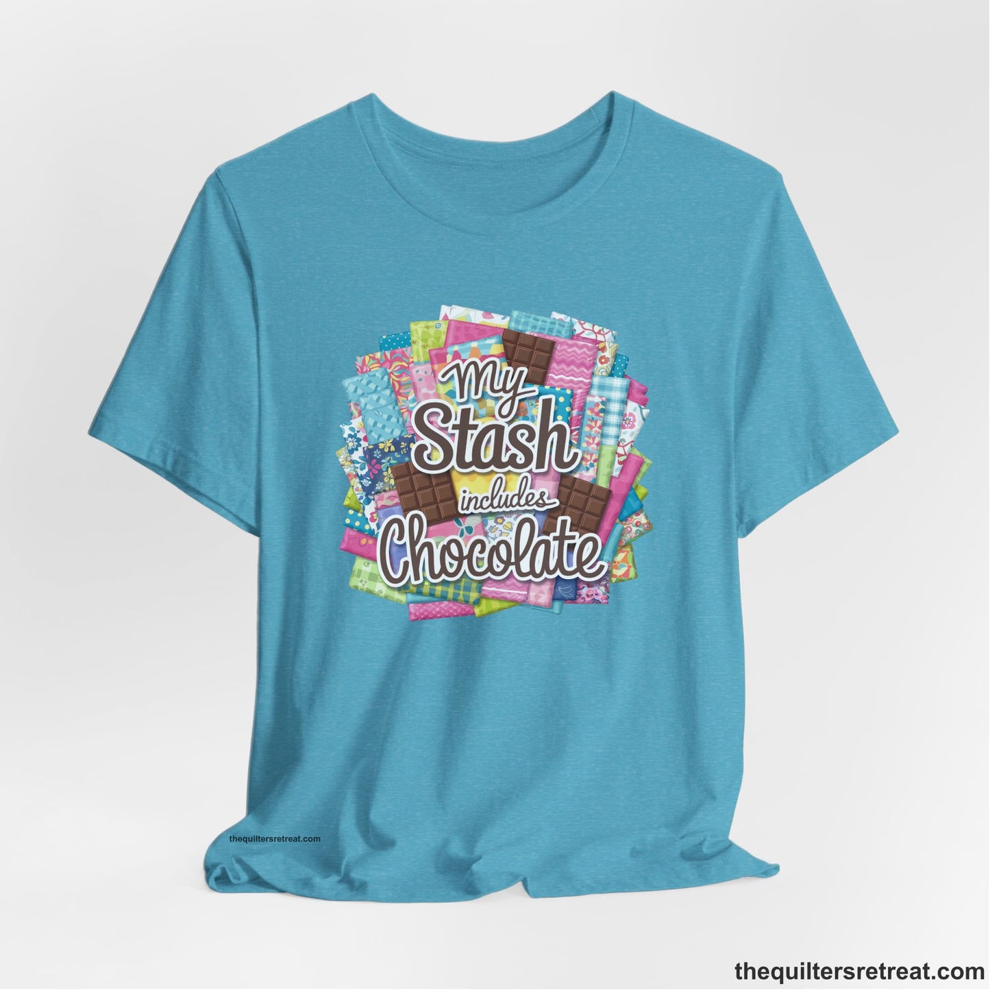 A Heather Aqua Short Sleeve T-Shirt with a fabric and chocolate collage with playful "My Stash includes Chocolate" text