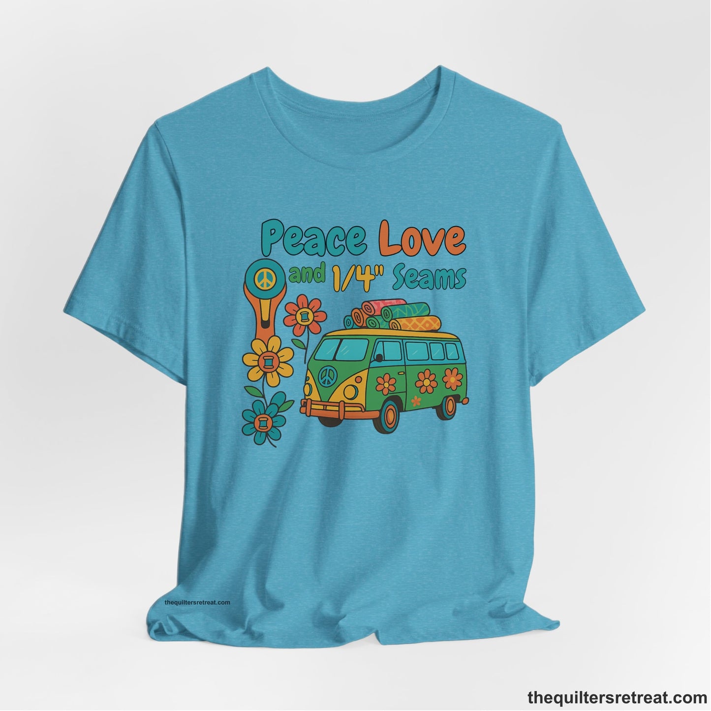 A Heather Aqua Short Sleeve T-Shirt with a peace sign van with colorful flowers and "Peace Love and 1/4 Seams" text in retro style