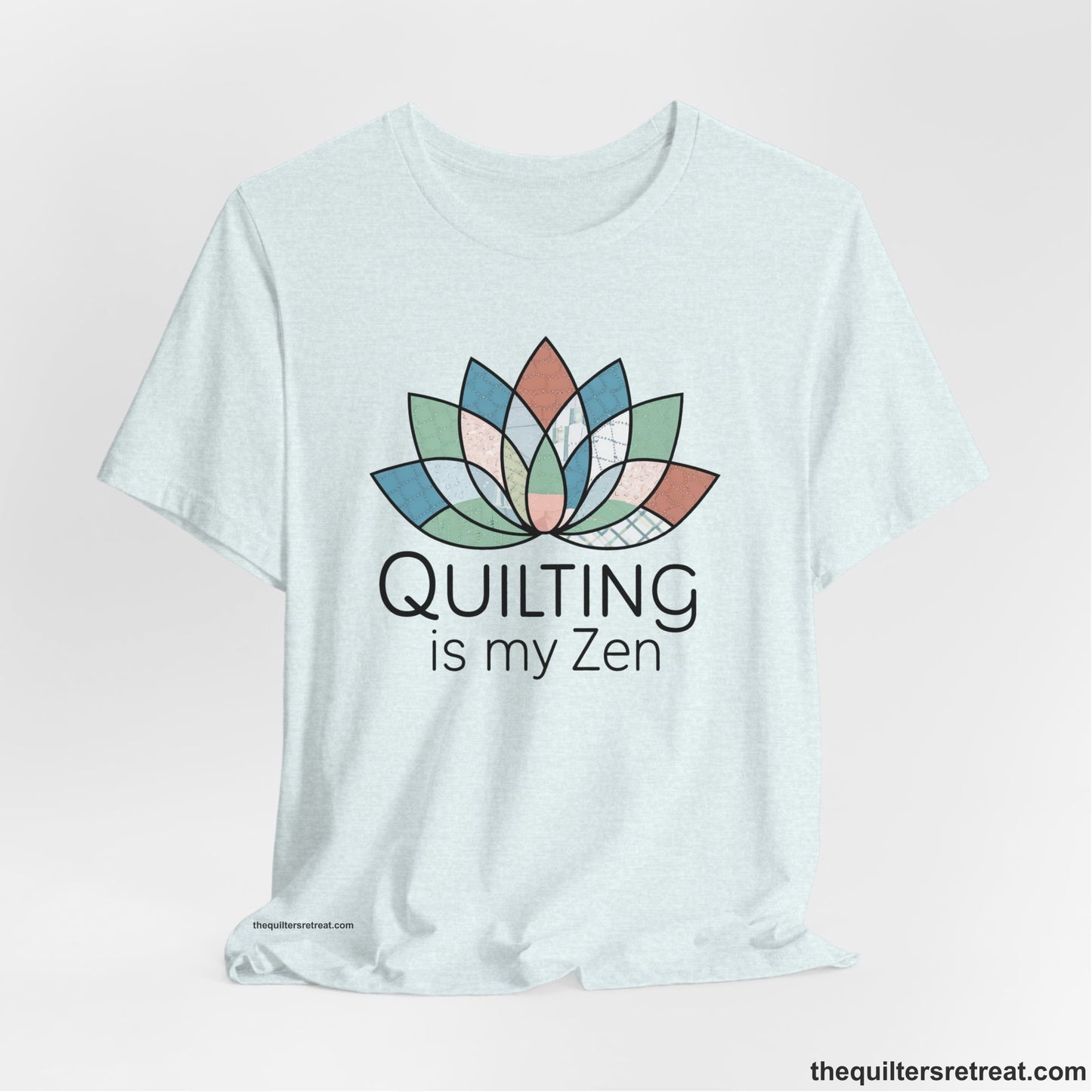 A Heather Ice Blue Short Sleeve T-Shirt with a floral quilt pattern with "Quilting is my Zen" text in a calm, soothing design