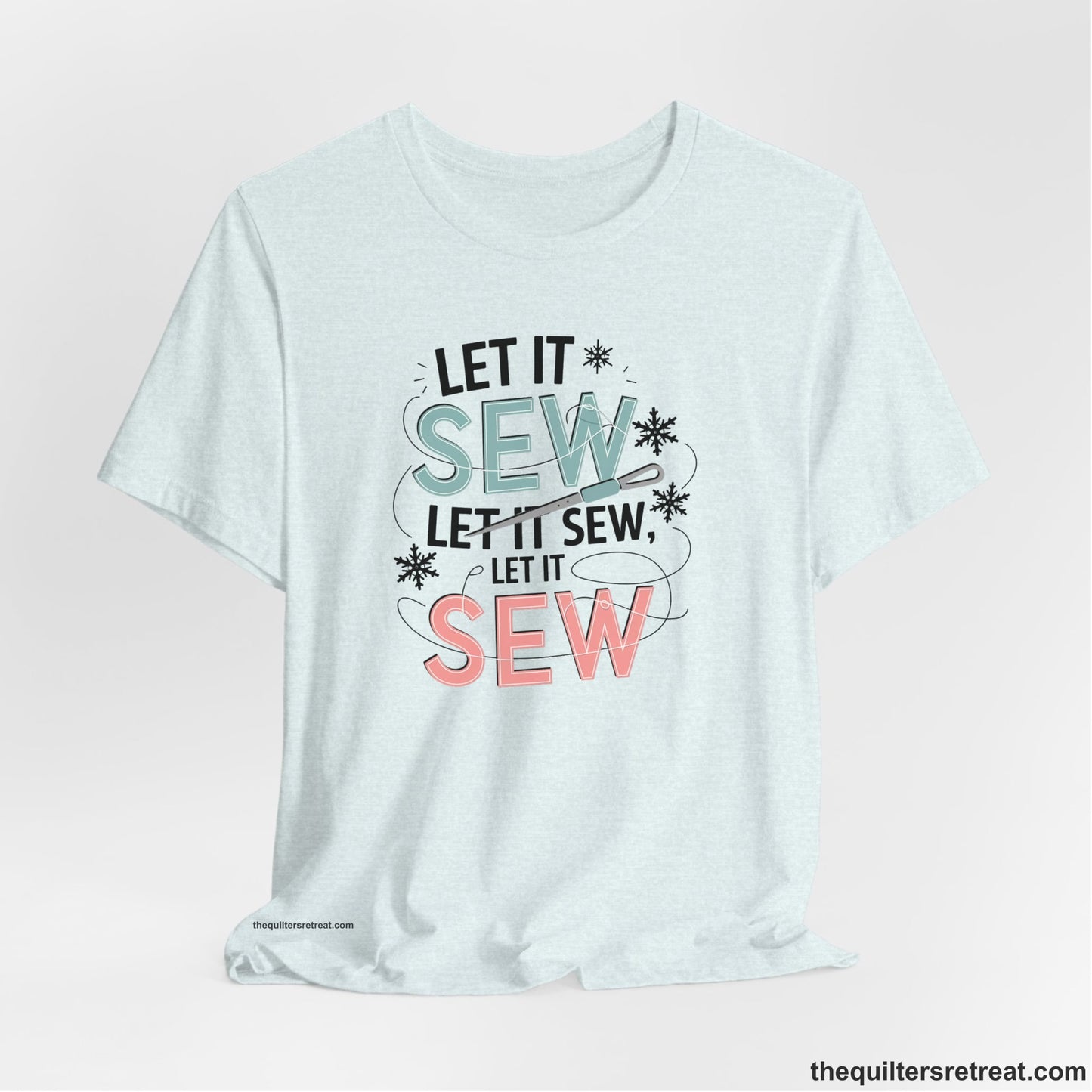 A Heather Ice Blue Short Sleeve T-Shirt with a bold "SEW" text with needle and thread in a modern style