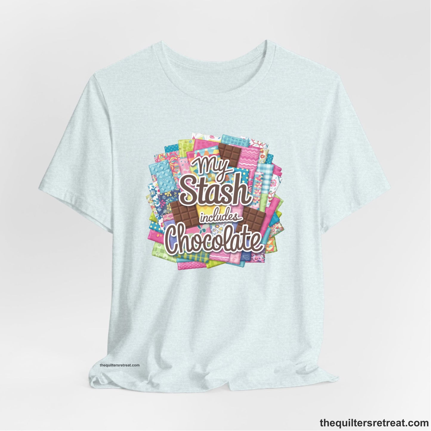A Heather Ice Blue Short Sleeve T-Shirt with a fabric and chocolate collage with playful "My Stash includes Chocolate" text