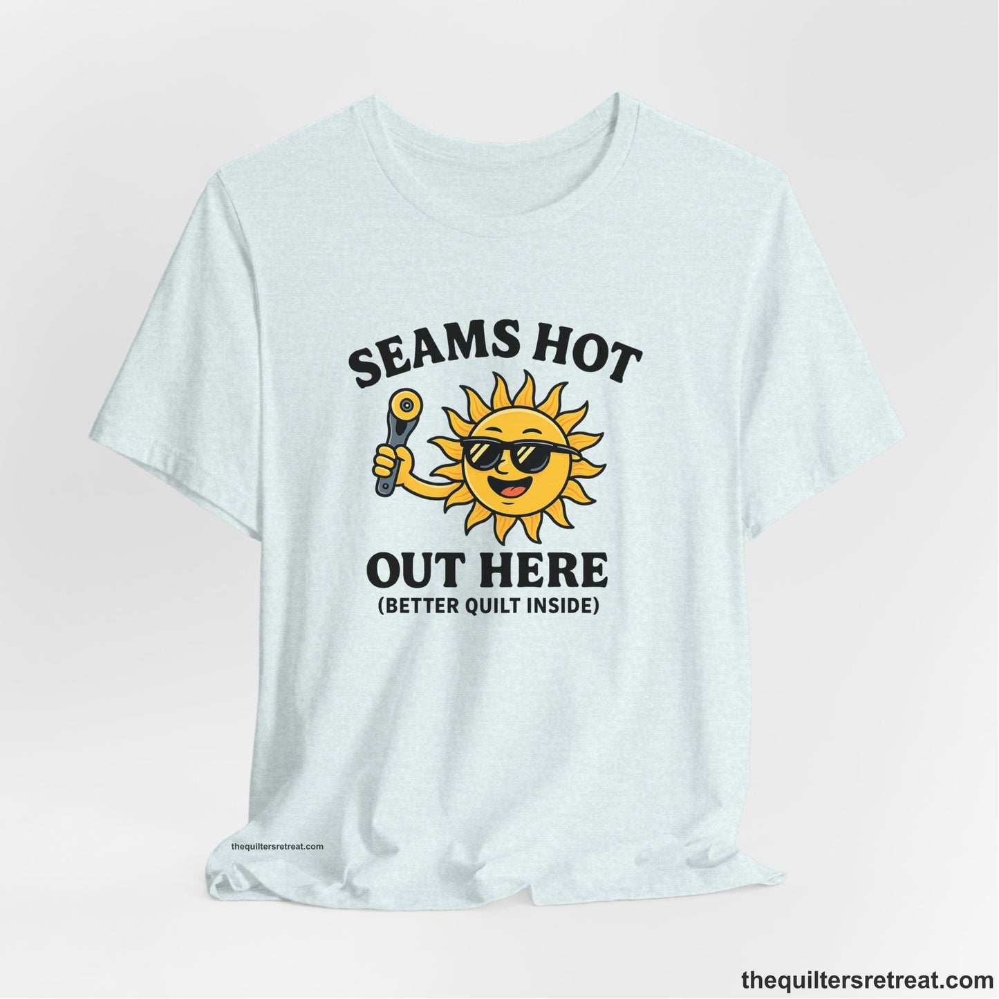 A Heather Ice Blue Short Sleeve T-Shirt with a smiling sun with sunglasses holding a pizza cutter in a playful cartoon style