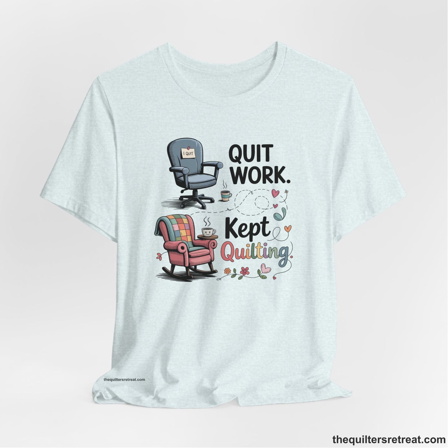 A Heather Ice Blue Short Sleeve T-Shirt with a quit work kept quilting text with cozy chairs and colorful floral accents in a whimsical style