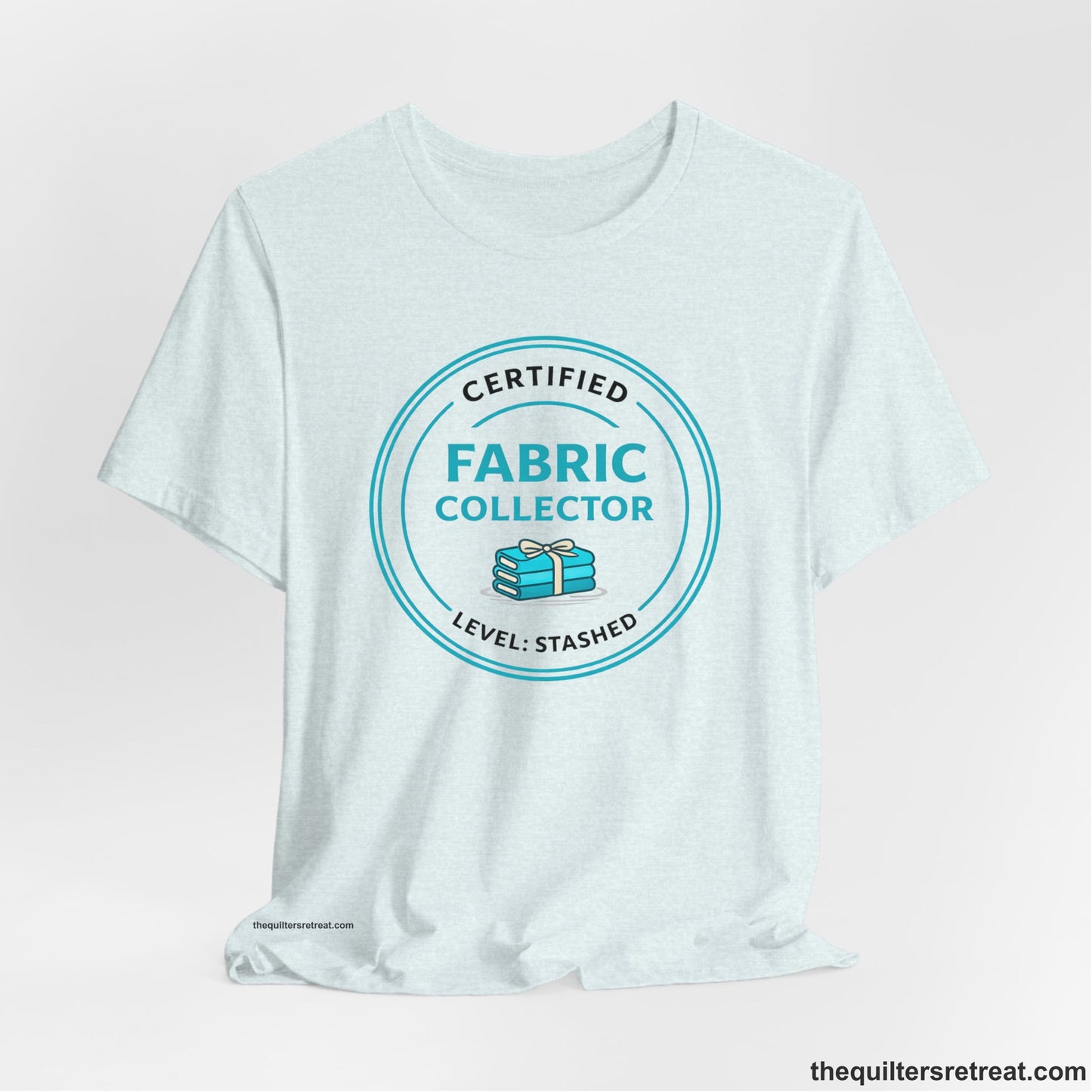 A  Short Sleeve T-Shirt featuring a playful design about fabric collecting.