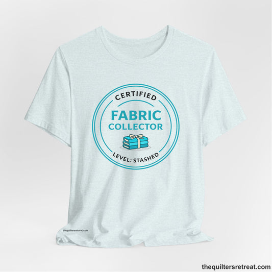 A  Short Sleeve T-Shirt featuring a playful design about fabric collecting.