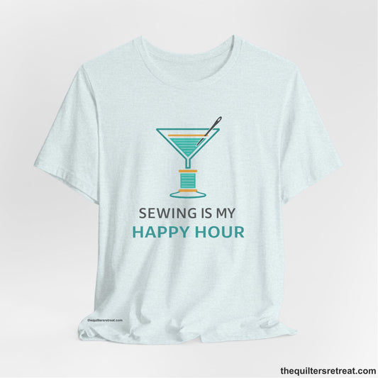 A Heather Ice Blue Short Sleeve T-Shirt with a Martini glass with spool of thread, needle; text: "Sewing is My Happy Hour."