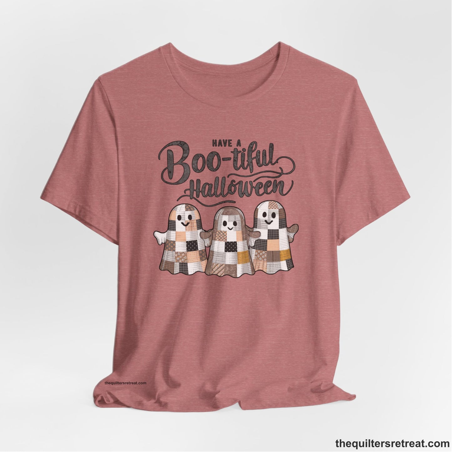 A Heather Mauve Short Sleeve T-Shirt with a cute patchwork ghosts with "Boo-tiful Halloween" text in a playful style