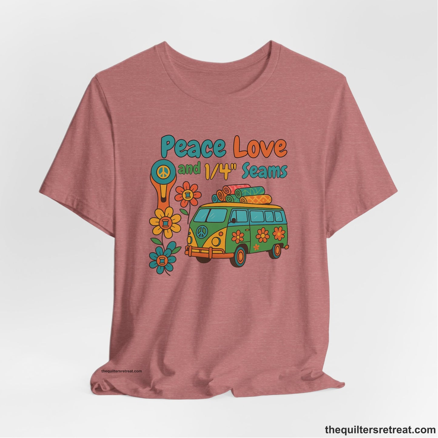 A Heather Mauve Short Sleeve T-Shirt with a peace sign van with colorful flowers and "Peace Love and 1/4 Seams" text in retro style