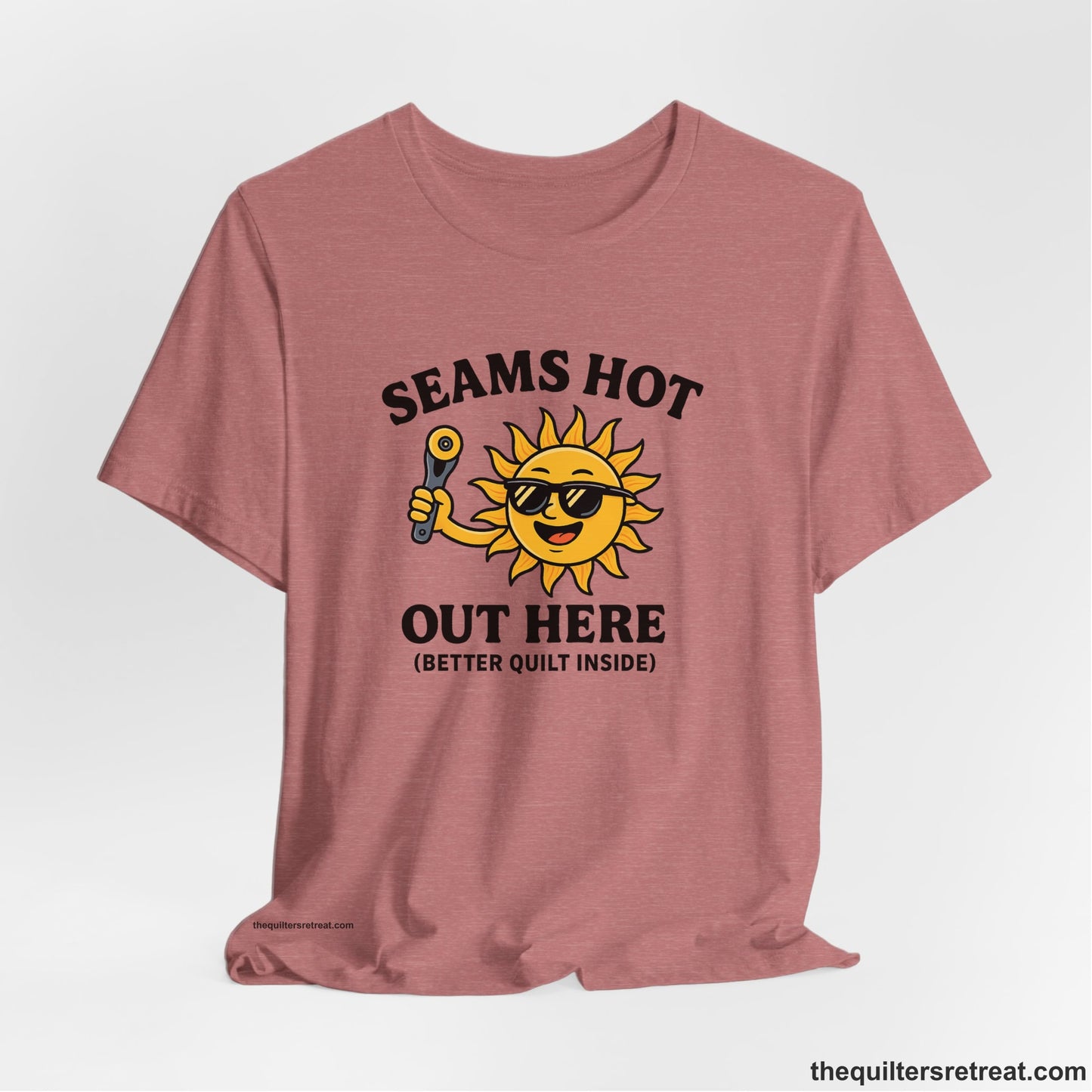 A Heather Mauve Short Sleeve T-Shirt with a smiling sun with sunglasses holding a pizza cutter in a playful cartoon style