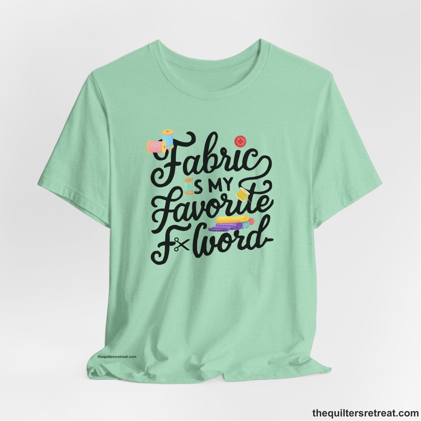 A Heather Mint Short Sleeve T-Shirt with a fabric is my favorite f word text with colorful spools and buttons in a playful style