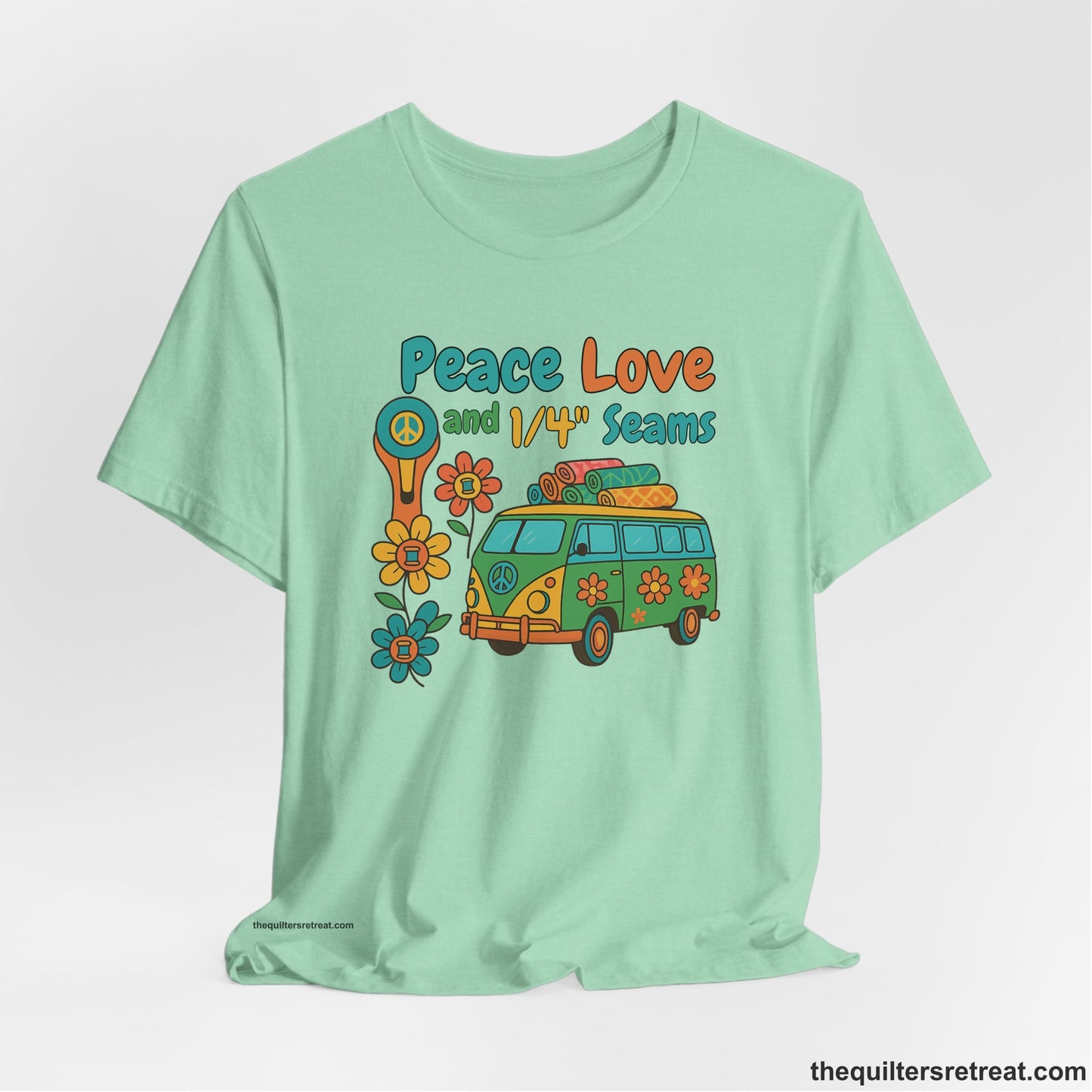A Heather Mint Short Sleeve T-Shirt with a peace sign van with colorful flowers and "Peace Love and 1/4 Seams" text in retro style