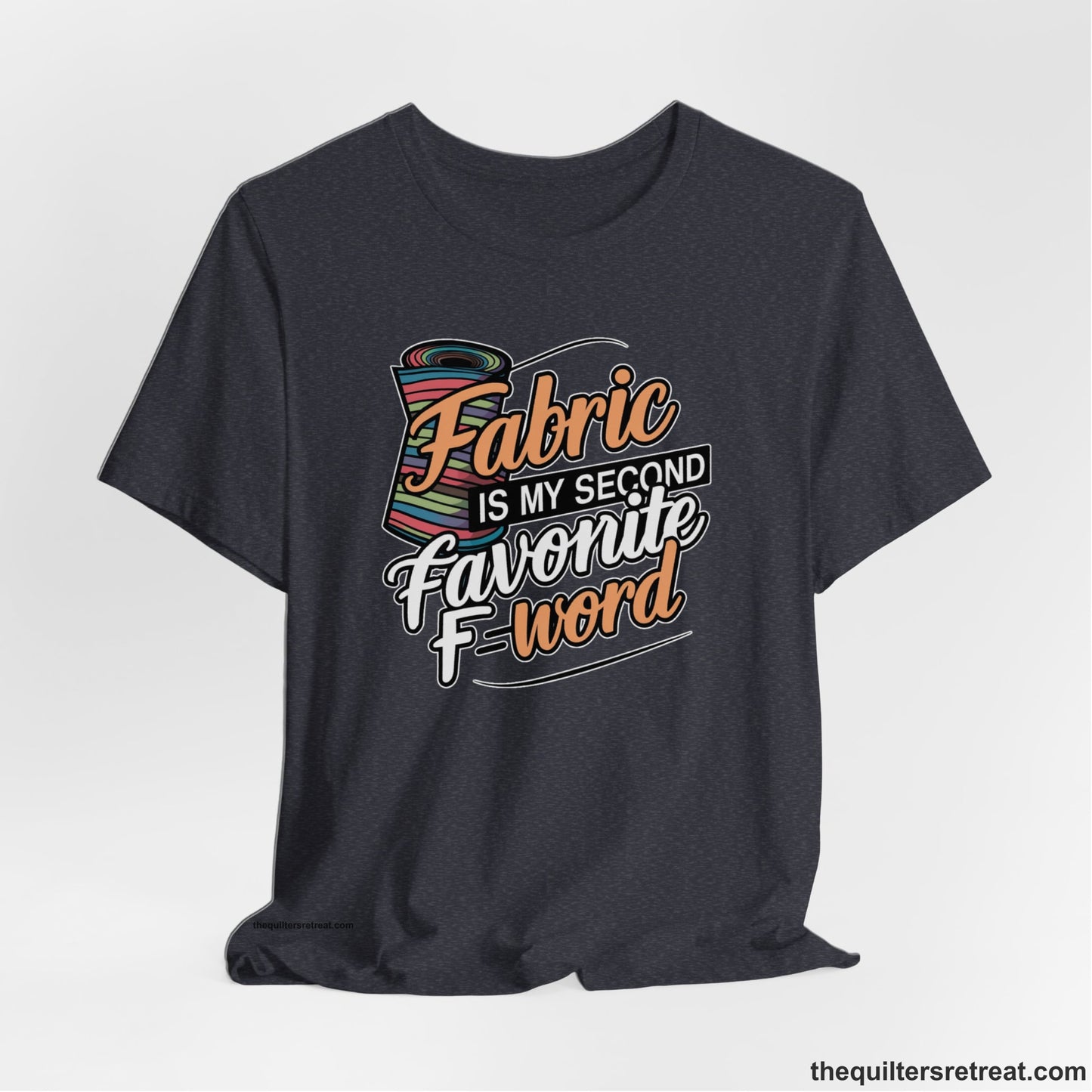 A Heather Navy Short Sleeve T-Shirt with a fabric bolt illustration with bold "Fabric Is My Second Favorite F Word" text