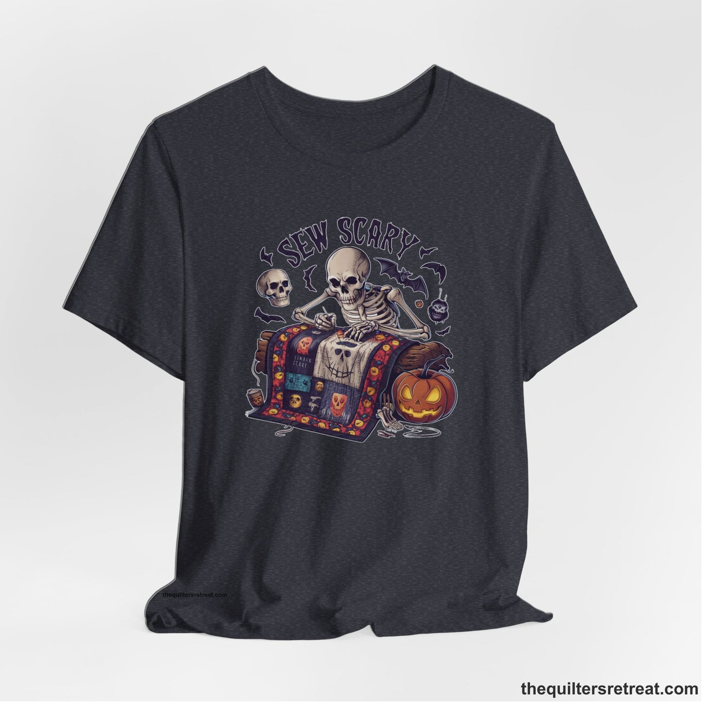 A Heather Navy Short Sleeve T-Shirt with a skeleton quilting with spooky accents and "Sew Scary" text in a Halloween theme