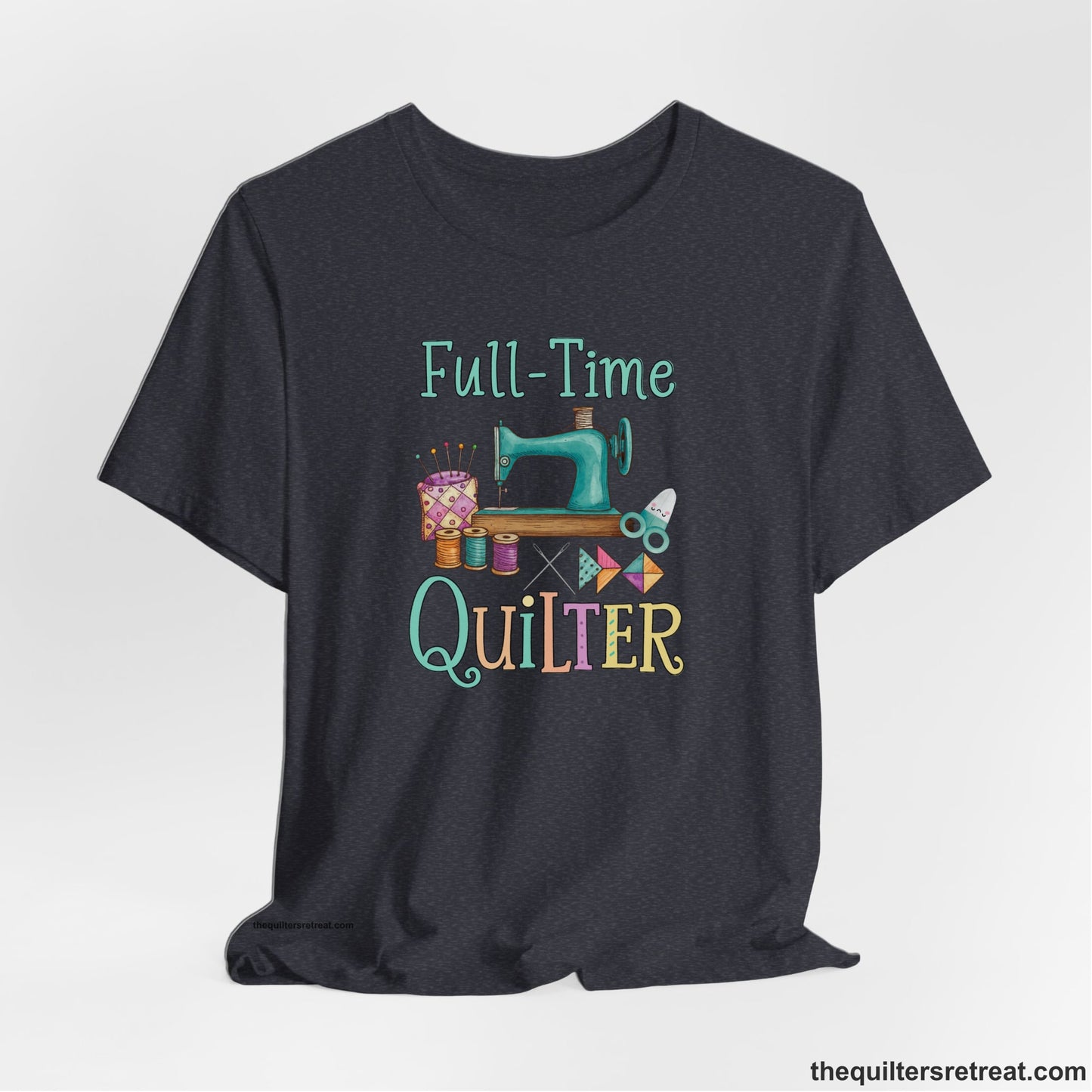 A Heather Navy Short Sleeve T-Shirt with a vintage sewing machine with colorful threads and "Full-Time Quilter" text in playful style