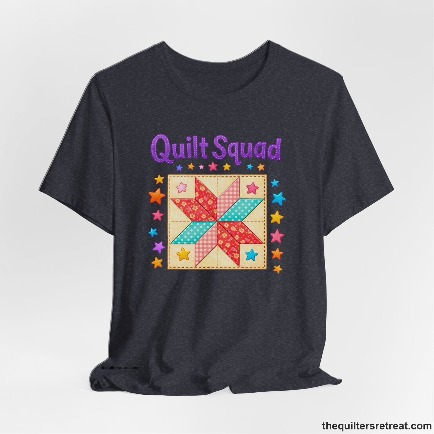 A Heather Navy Short Sleeve T-Shirt with a Patchwork quilt star with colorful stars, playful mood, "Quilt Squad" text.