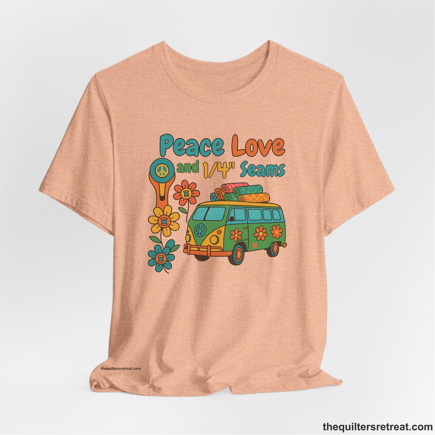 A Heather Peach Short Sleeve T-Shirt with a peace sign van with colorful flowers and "Peace Love and 1/4 Seams" text in retro style