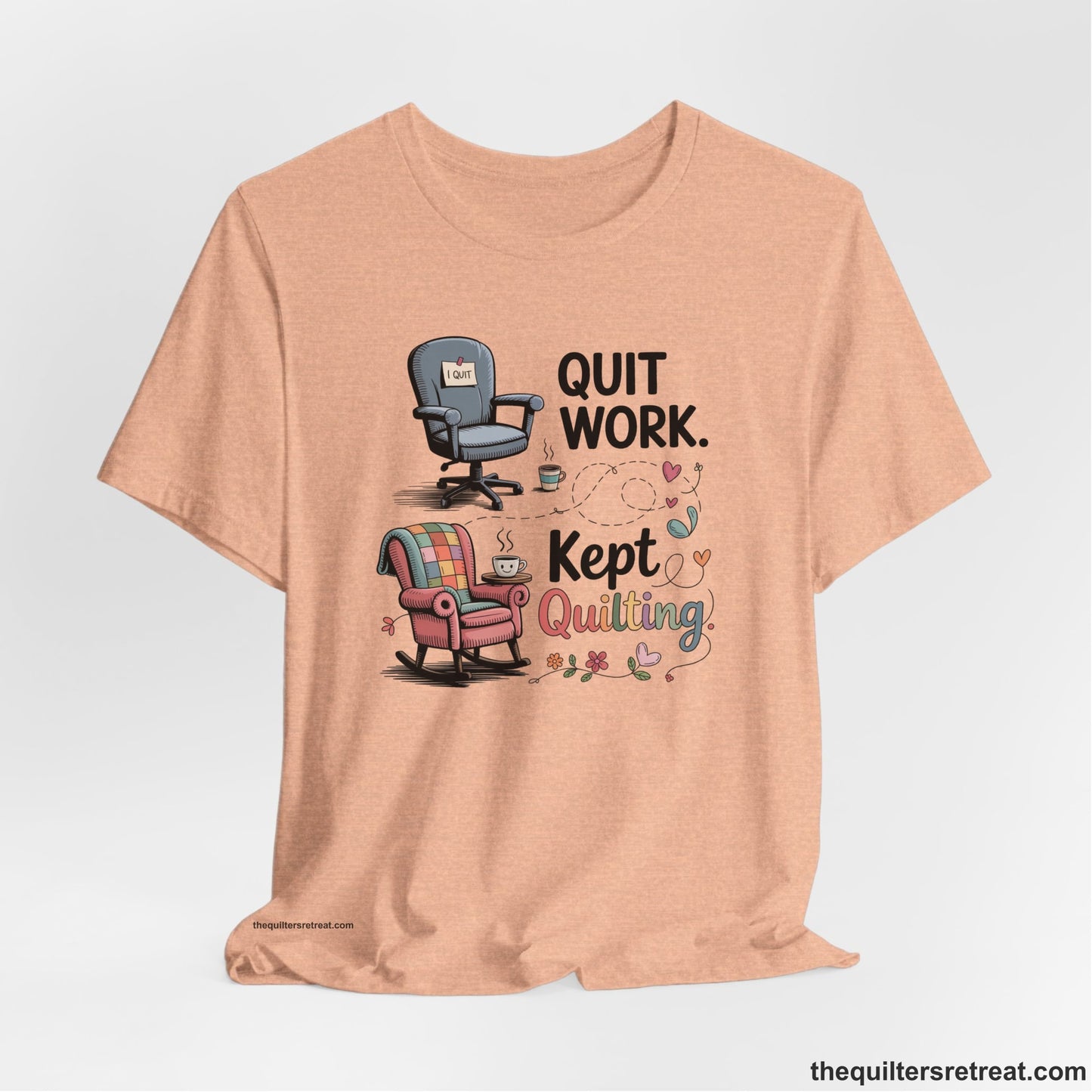 A Heather Peach Short Sleeve T-Shirt with a quit work kept quilting text with cozy chairs and colorful floral accents in a whimsical style