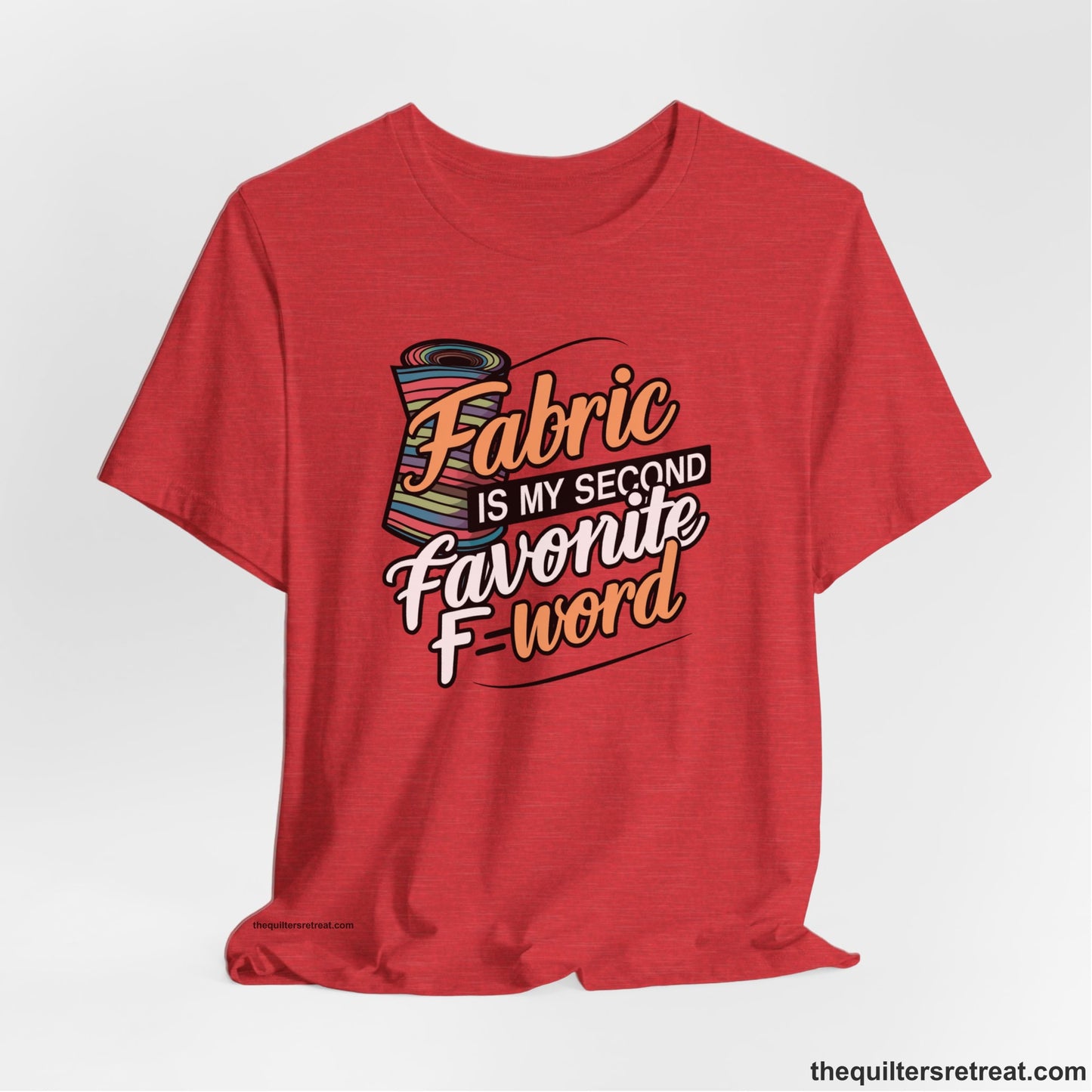 A Heather Red Short Sleeve T-Shirt with a fabric bolt illustration with bold "Fabric Is My Second Favorite F Word" text
