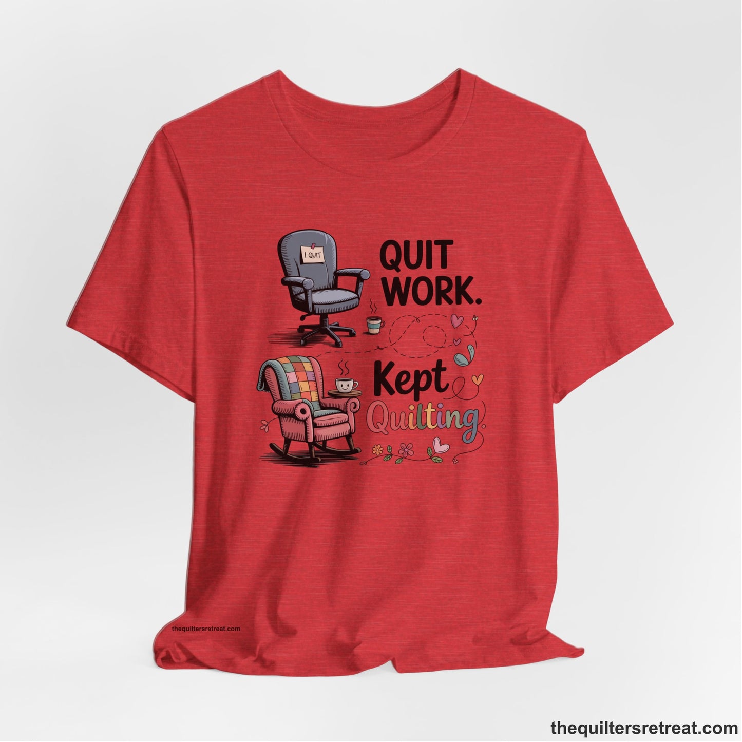 A Heather Red Short Sleeve T-Shirt with a quit work kept quilting text with cozy chairs and colorful floral accents in a whimsical style