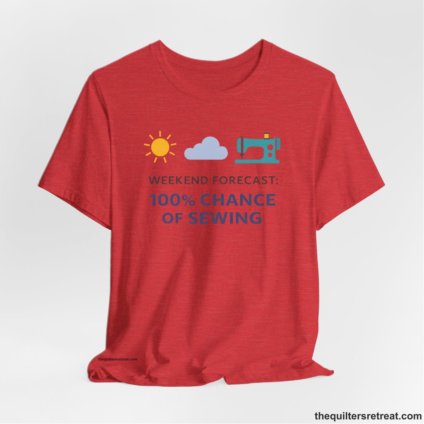 A Heather Red Short Sleeve T-Shirt with a Sun, cloud, sewing machine icons; bold text "Weekend Forecast: 100% Chance of Sewing"; playful style.