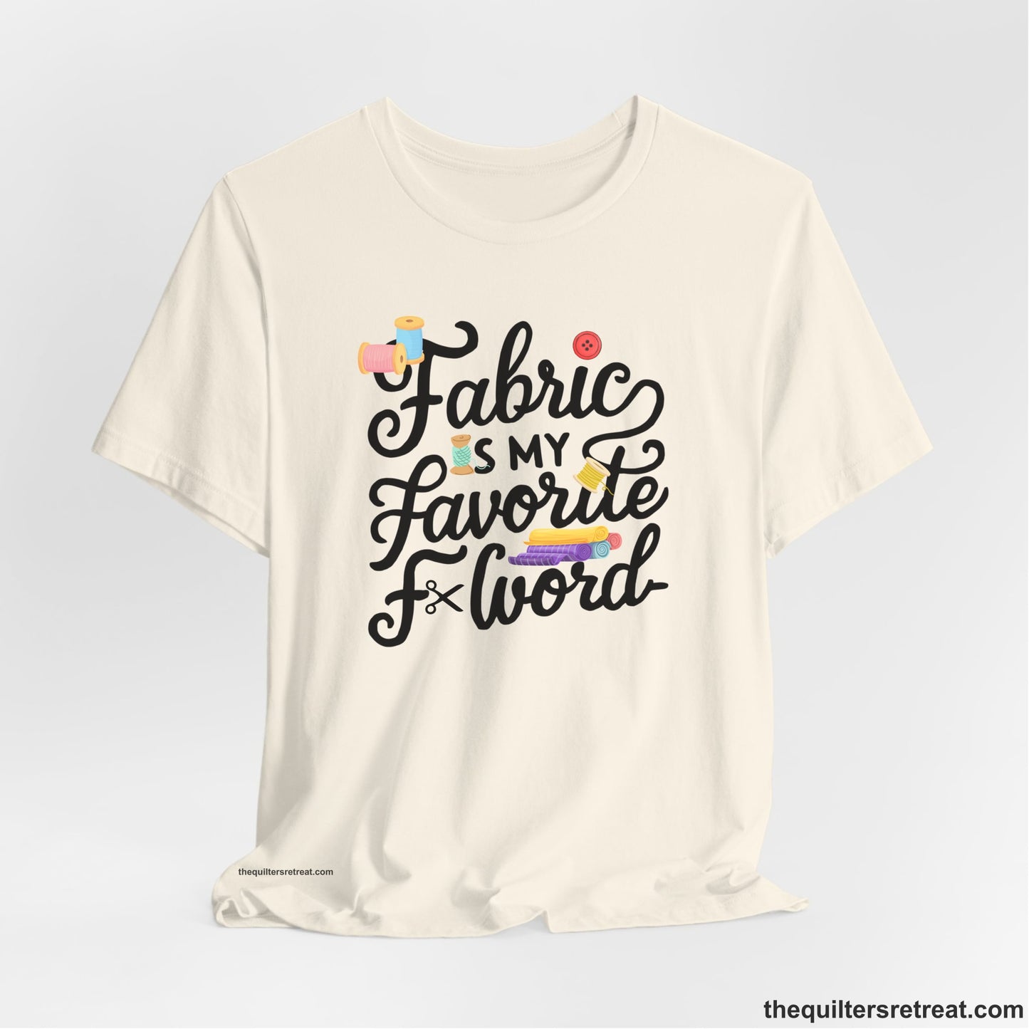 A Natural Short Sleeve T-Shirt with a fabric is my favorite f word text with colorful spools and buttons in a playful style