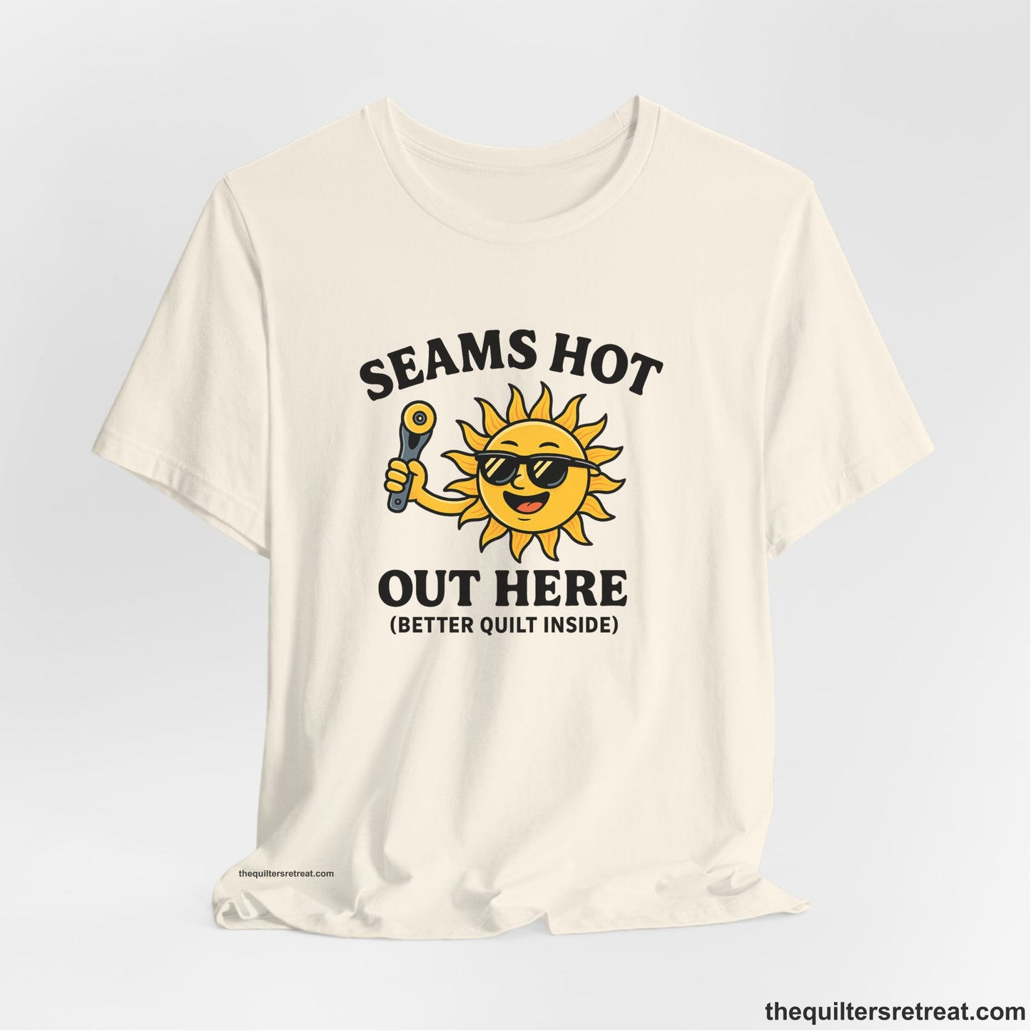 A Natural Short Sleeve T-Shirt with a smiling sun with sunglasses holding a pizza cutter in a playful cartoon style
