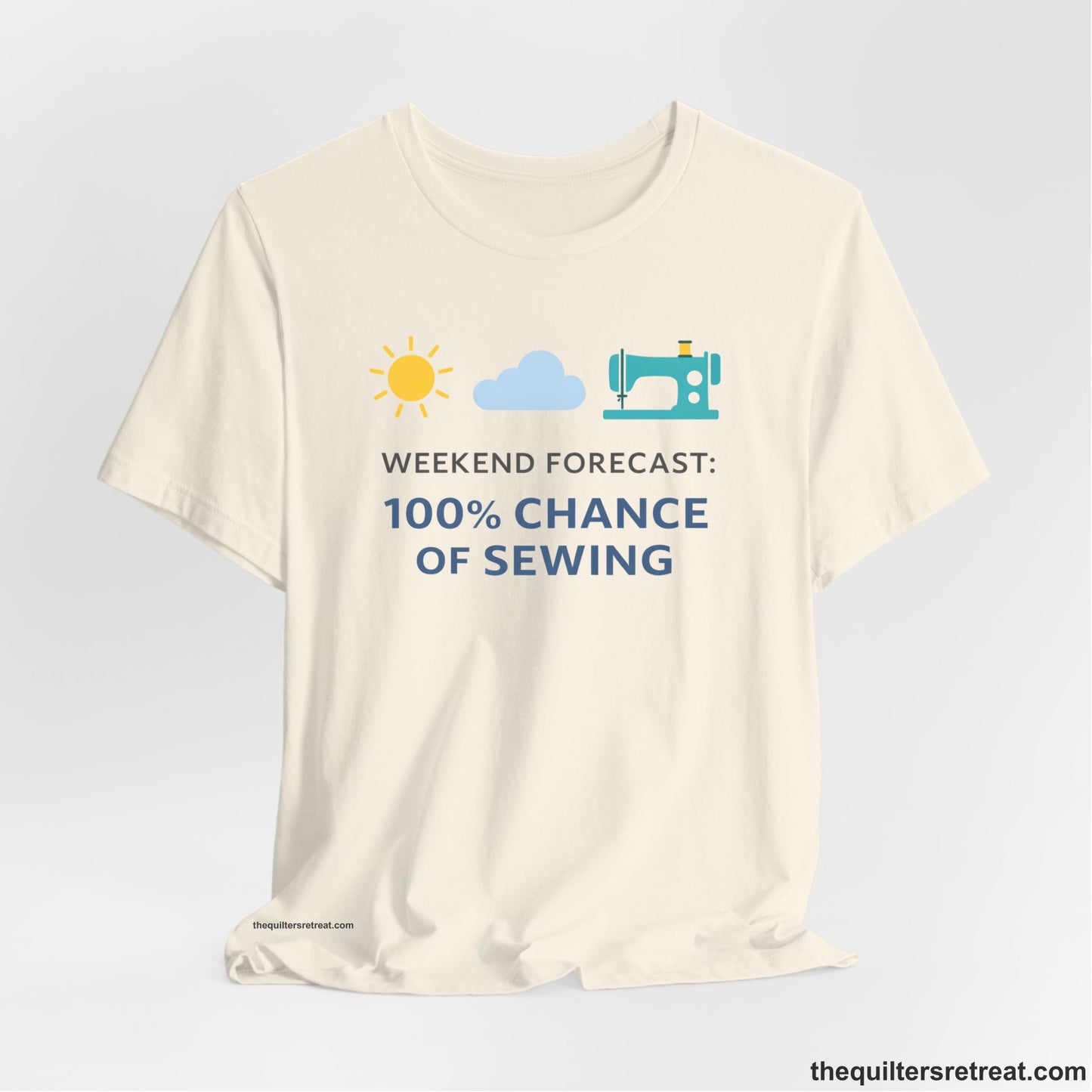 A Natural Short Sleeve T-Shirt with a Sun, cloud, sewing machine icons; bold text "Weekend Forecast: 100% Chance of Sewing"; playful style.