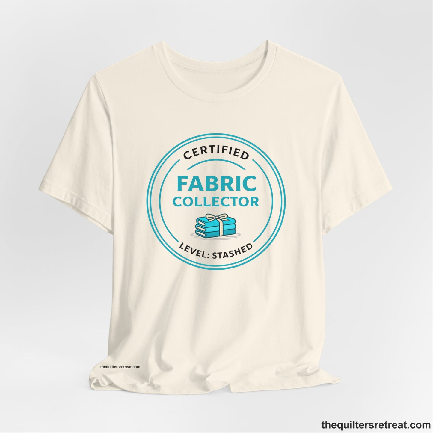 A  Short Sleeve T-Shirt featuring a playful design about fabric collecting.