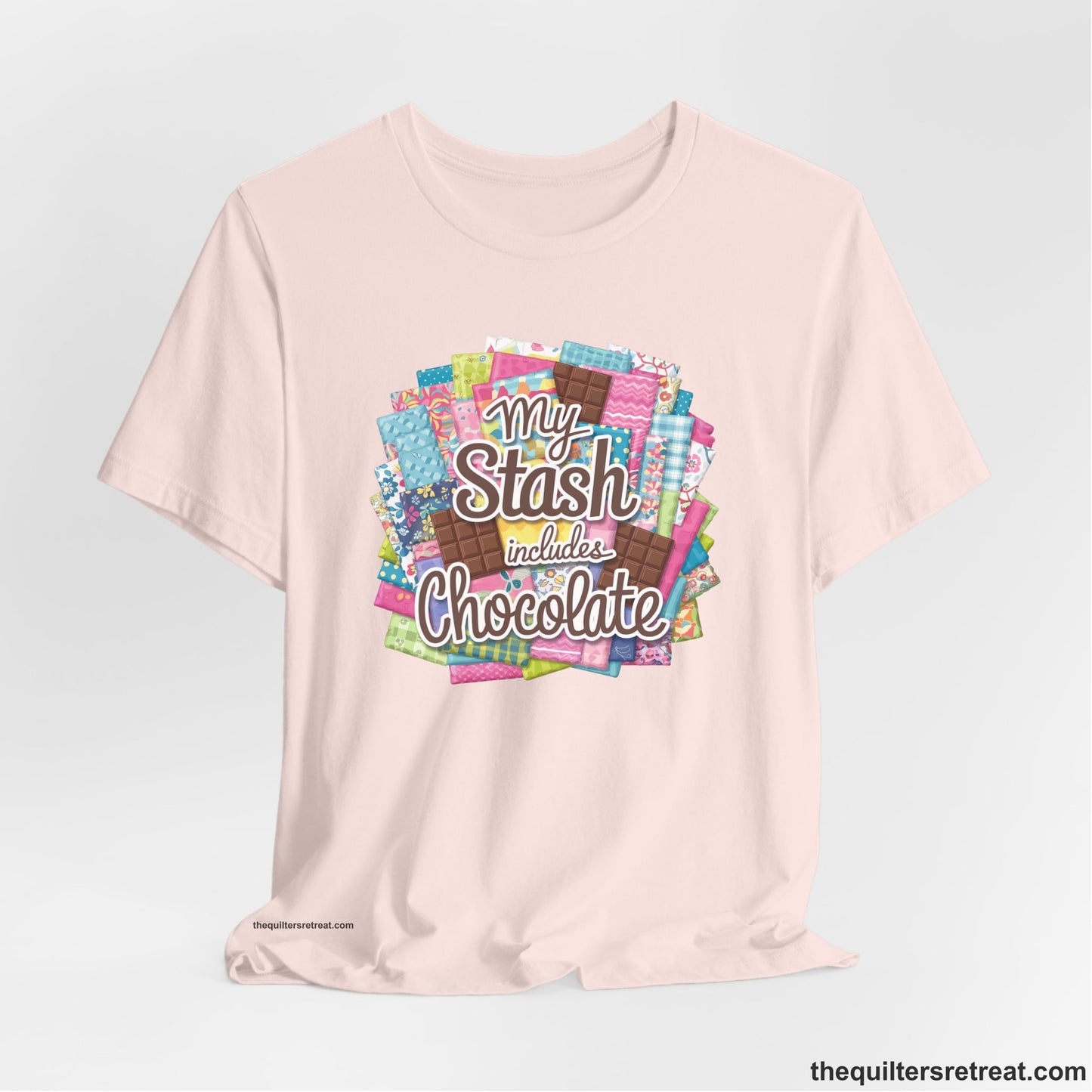 A Soft Pink Short Sleeve T-Shirt with a fabric and chocolate collage with playful "My Stash includes Chocolate" text
