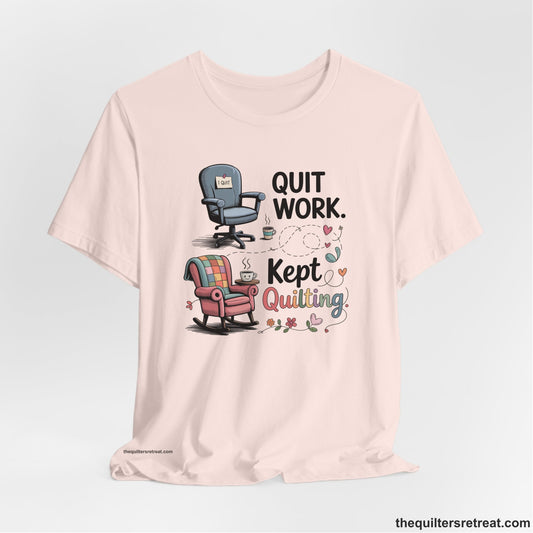 A Short Sleeve T-Shirt with a quit work kept quilting text with cozy chairs and colorful floral accents in a whimsical style