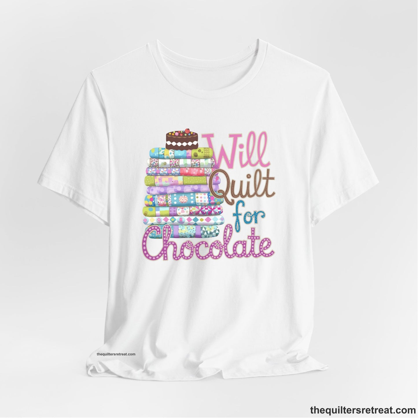 A White Short Sleeve T-Shirt with a stack of colorful quilts topped with cake, whimsical "Will Quilt for Chocolate" text
