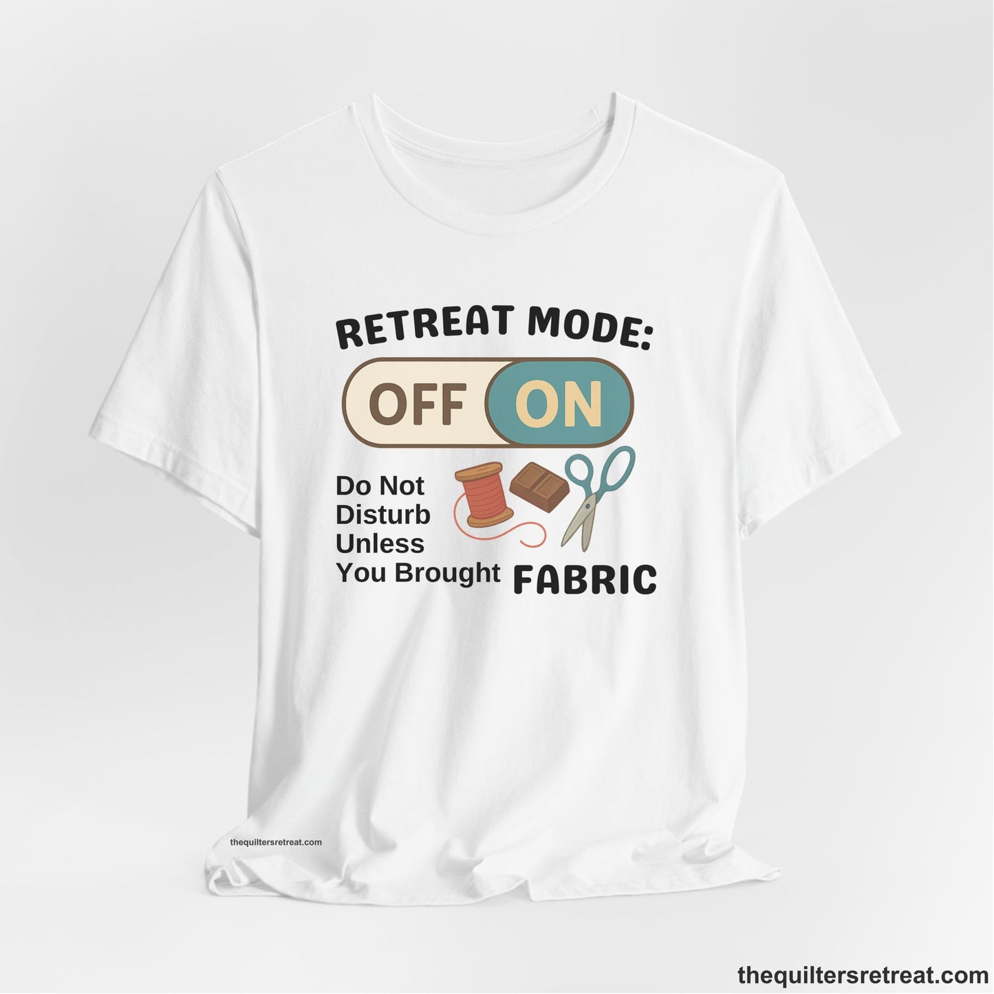 A White Short Sleeve T-Shirt with a illustration of sewing tools with a playful "OFF ON" switch design
